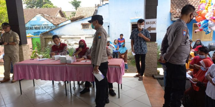 Polsek Bululawang Dampingi Acara Vaksinasi